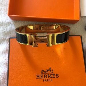 Classic black and gold Hermès H bracelet